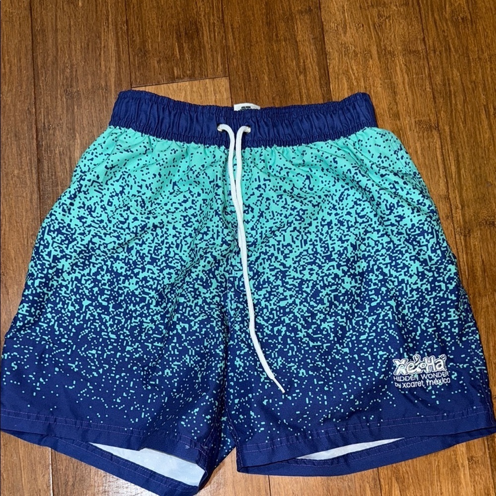 Men’s size medium, swim trunks excellent condition from Xel-ha in Mexico